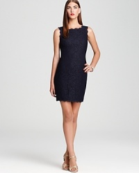 In all over lace, Adrianna Papell's short and sweet dress lends a timeless look with feminine appeal. In all over lace, Adrianna Papell's short and sweet dress lends a timeless look with feminine appeal.