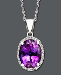 Look perfectly poised in purple. This stunning pendant features oval-cut amethyst (1-1/2 ct. t.w.) with diamond dusted edges. Crafted in 14k white gold. Approximate length: 18 inches. Approximate drop: 1/2 inch. Look perfectly poised in purple. This stunning pendant features oval-cut amethyst (1-1/2 ct. t.w.) with diamond dusted edges. Crafted in 14k white gold. Approximate length: 18 inches. Approximate drop: 1/2 inch.