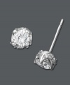 Sweet studs with all-over sparkle. A round-cut diamond (1/2 ct. t.w.) stud earring features a 14k white gold post setting and pave-set diamonds at the sides. Approximate diameter: 3 mm.