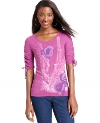 Try on Parisian chic with this lovely Style&co. top featuring prints of flowers and the Eiffel Tower. Shimmering studs and ruched sleeves add fashionable flair to your look! Try on Parisian chic with this lovely Style&co. top featuring prints of flowers and the Eiffel Tower. Shimmering studs and ruched sleeves add fashionable flair to your look!