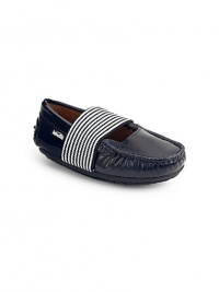 THE LOOKMoccasin silhouettePatent designRound toeGathered detailsSlip-on with striped elastic strap Back rubber knob detailsTHE MATERIALLeatherPadded leather insoleRubber soleCARE & ORIGINImported THE LOOKMoccasin silhouettePatent designRound toeGathered detailsSlip-on with striped elastic strap Back rubber knob detailsTHE MATERIALLeatherPadded leather insoleRubber soleCARE & ORIGINImported