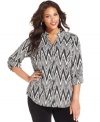 Team up your trousers with Style&co.'s printed plus size shirt.