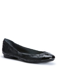 These stylish Calvin Klein flats are basic but far from boring with on-trend patent cap toes and a tonal, quilted circle pattern. These stylish Calvin Klein flats are basic but far from boring with on-trend patent cap toes and a tonal, quilted circle pattern.