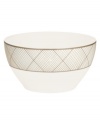 Dressed in a fine diamond grid of bronze and warm taupe, these small round bowls are tailored for formal dining and everyday elegance in bone china from Noritake dinnerware. The dishes are a handsome host for rice, sides or toppings.
