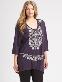 An embroidered cotton design with a feminine neckline and a beloved hi-lo hem design.V-neckThree-quarter sleevesPretty embroideryHi-lo hemBack yokeAbout 32 from shoulder to hemCottonMachine washImported An embroidered cotton design with a feminine neckline and a beloved hi-lo hem design.V-neckThree-quarter sleevesPretty embroideryHi-lo hemBack yokeAbout 32 from shoulder to hemCottonMachine washImported
