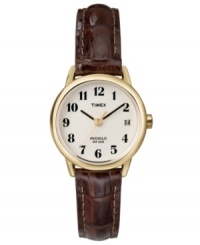 Beautiful croc-embossed leather lends an always-beautiful look to this versatile Timex watch. Brown croc-embossed leather strap with contrast stitching and goldtone round mixed metal case. White dial with logo, date window and black numerals. Analog movement. Water resistant to 30 meters. One-year limited warranty. Beautiful croc-embossed leather lends an always-beautiful look to this versatile Timex watch. Brown croc-embossed leather strap with contrast stitching and goldtone round mixed metal case. White dial with logo, date window and black numerals. Analog movement. Water resistant to 30 meters. One-year limited warranty.