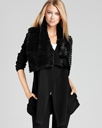 Inspired by the classic cardigans of the 50s, this long Theory sweater flaunts a lofty rabbit fur collar for a generous touch of luxe this season. Inspired by the classic cardigans of the 50s, this long Theory sweater flaunts a lofty rabbit fur collar for a generous touch of luxe this season.