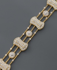 A bracelet built for a goddess, this clever design features a 14k gold setting with round-cut diamond (1 ct. t.w.). Approximate length: 7-1/2 inches. A bracelet built for a goddess, this clever design features a 14k gold setting with round-cut diamond (1 ct. t.w.). Approximate length: 7-1/2 inches.