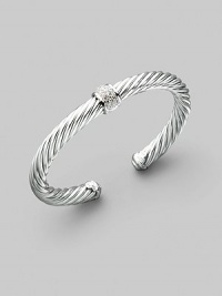 From the White Pavé Collection. An elegant combination of a bold sterling silver cable with sparkling pavé diamonds in the center and 18k white gold accents. Diamonds, 0.25 tcw Sterling silver & 18k white gold Cable, 7mm Diameter, about 2½ Made in USA From the White Pavé Collection. An elegant combination of a bold sterling silver cable with sparkling pavé diamonds in the center and 18k white gold accents. Diamonds, 0.25 tcw Sterling silver & 18k white gold Cable, 7mm Diameter, about 2½ Made in USA