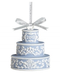 Two celebrations in one. Three tiers of powder-blue Wedgwood porcelain decked in scrolling white make this Our First Christmas cake ornament a must for newlyweds – and a cute wedding gift! Two celebrations in one. Three tiers of powder-blue Wedgwood porcelain decked in scrolling white make this Our First Christmas cake ornament a must for newlyweds – and a cute wedding gift!