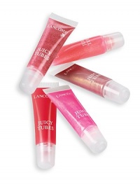 This ultra shiny gloss sweeps on a sheer, sexy wash of color in a variety of shades and flavors. You'll love the ultra-glossy formula that glides on easily with its tube-tip applicator. Perfectly portable, this essential gloss discreetly slips in a pocket or purse for a quick fix of fabulous anytime. Set Contains: Berry Bold, Miracle, Pink Horizon, Magic Spell and Raspberry Ice. This ultra shiny gloss sweeps on a sheer, sexy wash of color in a variety of shades and flavors. You'll love the ultra-glossy formula that glides on easily with its tube-tip applicator. Perfectly portable, this essential gloss discreetly slips in a pocket or purse for a quick fix of fabulous anytime. Set Contains: Berry Bold, Miracle, Pink Horizon, Magic Spell and Raspberry Ice.