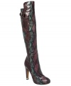 With a shiny metal plate on the bottom of the heel and sexy snake embossed leather, Donald Pliner's Dion boots have all the right fierce details.