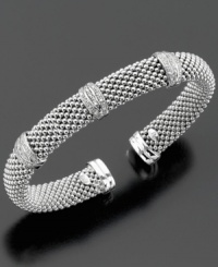 Part of the stylish Dewdrop collection, this diamond bracelet features round-cut diamond (1/3 ct. t.w.) set in sterling silver. Stretches to fit wrist. Approximate diameter: 2-1/4 inches. Part of the stylish Dewdrop collection, this diamond bracelet features round-cut diamond (1/3 ct. t.w.) set in sterling silver. Stretches to fit wrist. Approximate diameter: 2-1/4 inches.