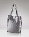 Take a shine to practical accessorizing with this tote from Lauren Ralph Lauren. Crafted from leather with an embossed logo, it's the perfect essential for the girl on the go.