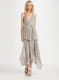 Tonal striped highlight this airy jersey knit crafted with a tiered handkerchief hem.V necklineSleevelessWrap-around beltTiered hemRacerbackAbout 43 from natural waist55% rayon/45% spandexDry cleanMade in USAOUR FIT MODEL RECOMMENDS ordering true size. Tonal striped highlight this airy jersey knit crafted with a tiered handkerchief hem.V necklineSleevelessWrap-around beltTiered hemRacerbackAbout 43 from natural waist55% rayon/45% spandexDry cleanMade in USAOUR FIT MODEL RECOMMENDS ordering true size.