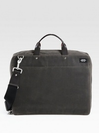 An updated classic with metropolitan style, crafted in sleek and sturdy waxed cotton with leather details.Zip closureTop handlesAdjustable shoulder strapExterior, interior zip pocketOrganizing pocketsFully lined12W x 16H x 3DImported An updated classic with metropolitan style, crafted in sleek and sturdy waxed cotton with leather details.Zip closureTop handlesAdjustable shoulder strapExterior, interior zip pocketOrganizing pocketsFully lined12W x 16H x 3DImported