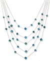Find a colorful new level of style. This five-row illusion necklace by c.A.K.e by Ali Khan boasts turquoise-colored glass beads (10-12 mm). Set in gold tone mixed metal. Approximate length: 17 inches + 3-inch extender. Approximate drop: 6 inches.