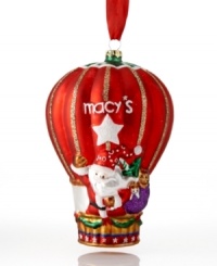 Santa and friends wave hello-ho-ho from the macy's hot air balloon. In gleaming red with gold glitter and Christmas garland, this whimsical ornament takes your tree to festive new heights. Santa and friends wave hello-ho-ho from the macy's hot air balloon. In gleaming red with gold glitter and Christmas garland, this whimsical ornament takes your tree to festive new heights.