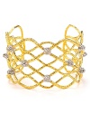 Take a detailed approach with this piece of woven wrist wear from Alexis Bittar. This statement cuff is crafted from gold plate with inset crystal studs for an added edge.