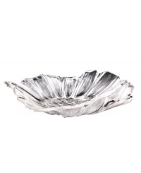A delicately ruffled flower in pure glass, this figural Leporis platter from Gibson suffuses your table with a touch of spring. Use for serving the meal or as a simple centerpiece. A delicately ruffled flower in pure glass, this figural Leporis platter from Gibson suffuses your table with a touch of spring. Use for serving the meal or as a simple centerpiece.