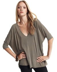 Extra slouchy equals extra sexy in this oversized Splendid top. Pair with a chunky bangle and your favorite skinny jeans for a chic day or night look. Extra slouchy equals extra sexy in this oversized Splendid top. Pair with a chunky bangle and your favorite skinny jeans for a chic day or night look.