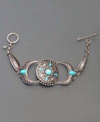 A touch of exotic charm and semi-precious stone accents add rich beauty to this silvertone mixed metal bracelet by Lucky Brand. Measures approximately 7-1/2 inches long. A touch of exotic charm and semi-precious stone accents add rich beauty to this silvertone mixed metal bracelet by Lucky Brand. Measures approximately 7-1/2 inches long.