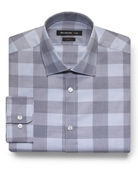 The oversized check print of this handsome dress shirt offers you an off-the-beaten-path pattern that differentiates your look in and outside the office. A fine ground for a colorful tie as well, rendered in classic cotton. The oversized check print of this handsome dress shirt offers you an off-the-beaten-path pattern that differentiates your look in and outside the office. A fine ground for a colorful tie as well, rendered in classic cotton.