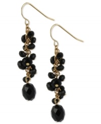 Embrace this pair of drop earrings from Kenneth Cole New York. Black beads wrap around the linear earrings crafted from gold-tone mixed metal. Approximate drop: 2-1/10 inches. Embrace this pair of drop earrings from Kenneth Cole New York. Black beads wrap around the linear earrings crafted from gold-tone mixed metal. Approximate drop: 2-1/10 inches.