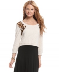 Nab fierce style with this cropped sweatshirt from American Rag that has a wild side, thanks to the awesome animal print panels! Nab fierce style with this cropped sweatshirt from American Rag that has a wild side, thanks to the awesome animal print panels!
