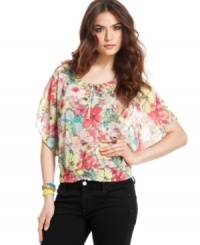 Get a botanical rush from this American Rag top, where a lush, floral print creates pretty, springlike style! Get a botanical rush from this American Rag top, where a lush, floral print creates pretty, springlike style!