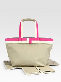 High style for your little one and for you, thoughtfully designed to stow all those take-along baby essentials with panache.Double top handles, 7.25 dropTop zip closureStroller clipsTwo inside bottle pocketsTwo inside open pocketsOne inside zip pocketIncludes changing pad and coin purse11.5W X 9.9H X 9.2DWipe cleanNylon with leather and grosgrain ribbon trimImported High style for your little one and for you, thoughtfully designed to stow all those take-along baby essentials with panache.Double top handles, 7.25 dropTop zip closureStroller clipsTwo inside bottle pocketsTwo inside open pocketsOne inside zip pocketIncludes changing pad and coin purse11.5W X 9.9H X 9.2DWipe cleanNylon with leather and grosgrain ribbon trimImported