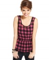 Rocking a mod, checkered print and peplum design, this top from Fire is all about fun day style!