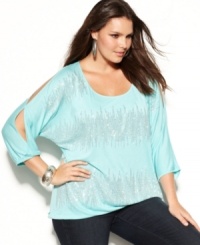 Show off your shimmer from day to night with INC's three-quarter sleeve plus size top, showcasing a rhinestone front. Show off your shimmer from day to night with INC's three-quarter sleeve plus size top, showcasing a rhinestone front.