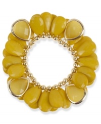 Bright colors make the season. Haskell's shaky bracelet combines teardrop-shaped chartreuse acrylic beads with gold tone metal details. Set in gold tone mixed metal. Bracelet stretches to fit wrist. Approximate length: 7-1/2 inches.