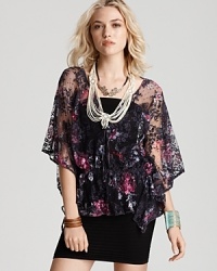 Boost your most basic LBDs with this lace Free People kaftan embellished with a lovely floral print and pretty draped sleeves. Cinched for a feminine silhouette, this sheer style is simply sublime. Boost your most basic LBDs with this lace Free People kaftan embellished with a lovely floral print and pretty draped sleeves. Cinched for a feminine silhouette, this sheer style is simply sublime.