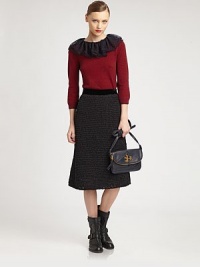 Woven sweater skirt with a velvet waistband and length that hits below the knees. Velvet waistbandSide zipperAbout 29 long67% cotton/33% polyesterDry cleanImportedModel shown is 5'11 (178cm) wearing US size Small. Woven sweater skirt with a velvet waistband and length that hits below the knees. Velvet waistbandSide zipperAbout 29 long67% cotton/33% polyesterDry cleanImportedModel shown is 5'11 (178cm) wearing US size Small.
