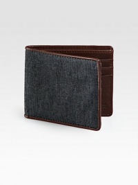 Taken from heritage suiting fabric, this wallet embodies a classic tailoring aesthetic and is French-edged with leather.One billfold compartmentSix card slotsCotton/leather4W x 4HImported Taken from heritage suiting fabric, this wallet embodies a classic tailoring aesthetic and is French-edged with leather.One billfold compartmentSix card slotsCotton/leather4W x 4HImported