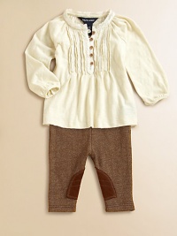 A preppy tunic-and-legging set features a pretty pintucked top and tweed leggings for a heritage-inspired look. Tunic Lace-trimmed stand collarLong sleevesButton-frontFlared hem Leggings Elastic waistbandSuede knee patchesTunic: CottonLeggings: 93% cotton/7% elastaneMachine washImported Please note: Number of buttons may vary depending on size ordered. A preppy tunic-and-legging set features a pretty pintucked top and tweed leggings for a heritage-inspired look. Tunic Lace-trimmed stand collarLong sleevesButton-frontFlared hem Leggings Elastic waistbandSuede knee patchesTunic: CottonLeggings: 93% cotton/7% elastaneMachine washImported Please note: Number of buttons may vary depending on size ordered.