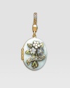 Aquamarine-colored CRYSTALLIZED - Swarovski Elements sparkle on this handcrafted, hand-enameled birthstone locket that opens to hold a favorite photo. Crystal Enamel 18k goldplated brass & brass-plated pewter Month indicated on the back Length, about 1¼ Width, about 1 Spring clip clasp Made in USA