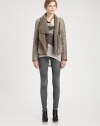 From understated to downtown-chic, this distressed leather jacket finishes the look with dyed shearling trim and a draped front. Dyed shearling collarFront zipper; snap closuresLong sleeves with zippered cuffsDyed shearling liningAbout 25 from shoulder to hemBody: LeatherTrim: Dyed shearlingDry cleanImportedFur origin: SpainModel shown is 5'9 (176cm) wearing US size Small.