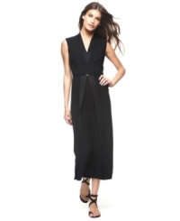 Infused with architecturally inspired allure, this dress sets a modern mood with a crisp V-neckline and a contemporary take on a tea-length silhouette. By Francisco Costa for Calvin Klein. Infused with architecturally inspired allure, this dress sets a modern mood with a crisp V-neckline and a contemporary take on a tea-length silhouette. By Francisco Costa for Calvin Klein.