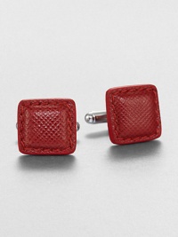 Distinctive cuff links crafted of textured leather. About 0.6 squareMade in Italy