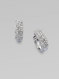 Dazzle in these petite huggie hoops accented with sparkling rhinestones. Brass and sterling silverGlass stonesLength, about ½Hinge-and-post backImported 