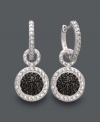 Mix and match with chic, contrasting style. Victoria Townsend's dynamic drop earrings feature a circle charm and hoop design accented by sparkling black and white diamonds. Set in sterling silver. Approximate drop: 1-1/16 inches.