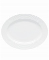 Dine with Wickford dinnerware and tie in timeless sophistication with every meal. This versatile white porcelain oval platter has a contemporary shape embossed with a twisting rope design.