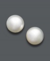 Look the picture of elegance in polished studs. Earrings highlight a single cultured South Sea pearl (11-12 mm) in a 14k white gold post setting. Approximate diameter: 1/2 inch.