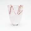 Each unique, this artistic vase, designed by Anna Ehrner features swirling lines and veils of color.