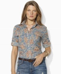 Lauren Jeans Co.'s breezy cotton shirt updates the classic workwear style with a vibrant floral pattern and chic rolled sleeves. Lauren Jeans Co.'s breezy cotton shirt updates the classic workwear style with a vibrant floral pattern and chic rolled sleeves.