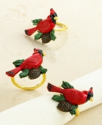 Put the finishing touches on your holiday table with these festive napkin rings. A red cardinal perched on a pine cone sets a warm, inviting tone at every wintry celebration. Put the finishing touches on your holiday table with these festive napkin rings. A red cardinal perched on a pine cone sets a warm, inviting tone at every wintry celebration.