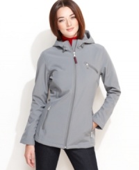 Tommy Hilfiger's sporty soft shell jacket is great for outdoor activities and features a tech fleece lining for an extra-cozy touch. Tommy Hilfiger's sporty soft shell jacket is great for outdoor activities and features a tech fleece lining for an extra-cozy touch.
